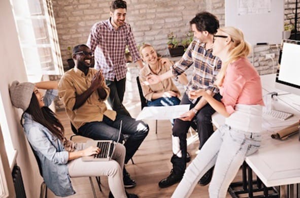 Millennials gather in an office setting