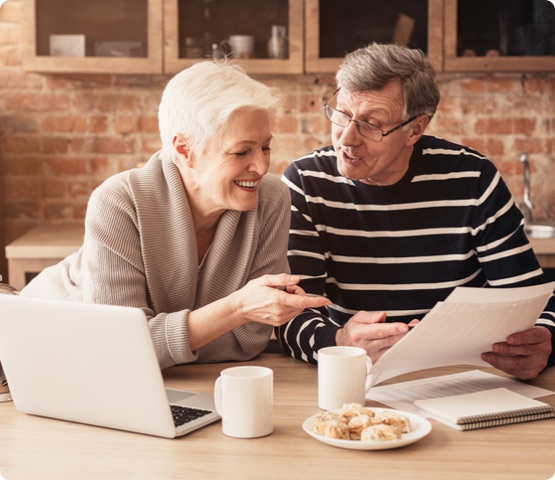 Retirement Financial Planning. Senior Couple Discussing Family Budget