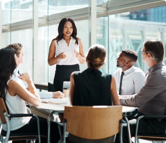 Group of co-workers having a meeting in a modern office